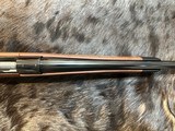 NEW WINCHESTER MODEL 70 SUPER GRADE 300 WIN MAG 26