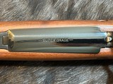 NEW WINCHESTER MODEL 70 SUPER GRADE 300 WIN MAG 26