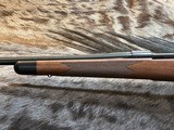 NEW WINCHESTER MODEL 70 SUPER GRADE 300 WIN MAG 26