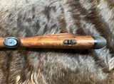 NEW WINCHESTER MODEL 70 SUPER GRADE 300 WIN MAG 26