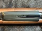 NEW WINCHESTER MODEL 70 SUPER GRADE 300 WIN MAG 26