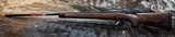 NEW WINCHESTER MODEL 70 SUPER GRADE 300 WIN MAG 26