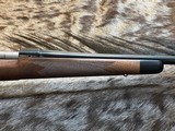 NEW WINCHESTER MODEL 70 SUPER GRADE 300 WIN MAG 26