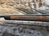 NEW WINCHESTER MODEL 70 SUPER GRADE 300 WIN MAG 26