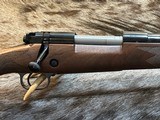 NEW WINCHESTER MODEL 70 SUPER GRADE 300 WIN MAG 26