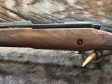 NEW WINCHESTER MODEL 70 SUPER GRADE 300 WIN MAG 26