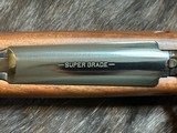 NEW WINCHESTER MODEL 70 SUPER GRADE 300 WIN MAG 26