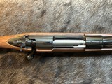 NEW WINCHESTER MODEL 70 SUPER GRADE 300 WIN MAG 26