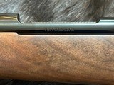 NEW WINCHESTER MODEL 70 SUPER GRADE 300 WIN MAG 26