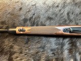 NEW WINCHESTER MODEL 70 SUPER GRADE 300 WIN MAG 26