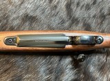 NEW WINCHESTER MODEL 70 SUPER GRADE 300 WIN MAG 26