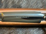 NEW WINCHESTER MODEL 70 SUPER GRADE 300 WIN MAG 26