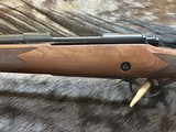 NEW WINCHESTER MODEL 70 SUPER GRADE 300 WIN MAG 26