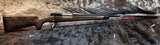 NEW WINCHESTER MODEL 70 SUPER GRADE 300 WIN MAG 26