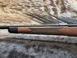 NEW WINCHESTER MODEL 70 SUPER GRADE 300 WIN MAG 26