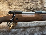 NEW WINCHESTER MODEL 70 SUPER GRADE 300 WIN MAG 26