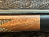 NEW WINCHESTER MODEL 70 SUPER GRADE 300 WIN MAG 26
