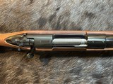 NEW WINCHESTER MODEL 70 SUPER GRADE 300 WIN MAG 26