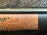NEW WINCHESTER MODEL 70 SUPER GRADE 300 WIN MAG 26