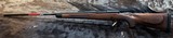 NEW WINCHESTER MODEL 70 SUPER GRADE 300 WIN MAG 26