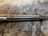 NEW WINCHESTER MODEL 70 SUPER GRADE 300 WIN MAG 26