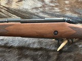 NEW WINCHESTER MODEL 70 SUPER GRADE 300 WIN MAG 26