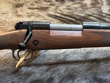 NEW WINCHESTER MODEL 70 SUPER GRADE 300 WIN MAG 26
