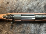 NEW WINCHESTER MODEL 70 SUPER GRADE 300 WIN MAG 26