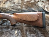 NEW WINCHESTER MODEL 70 SUPER GRADE 300 WIN MAG 26