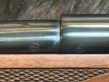 NEW WINCHESTER MODEL 70 SUPER GRADE 300 WIN MAG 26