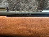 NEW WINCHESTER MODEL 70 SUPER GRADE 300 WIN MAG 26