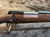 NEW WINCHESTER MODEL 70 SUPER GRADE 300 WIN MAG 26