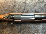 NEW WINCHESTER MODEL 70 SUPER GRADE 300 WIN MAG 26