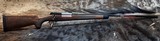 NEW WINCHESTER MODEL 70 SUPER GRADE 300 WIN MAG 26