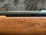 NEW WINCHESTER MODEL 70 SUPER GRADE 300 WIN MAG 26