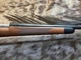 NEW WINCHESTER MODEL 70 SUPER GRADE 300 WIN MAG 26