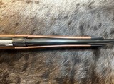 NEW WINCHESTER MODEL 70 SUPER GRADE 300 WIN MAG 26