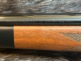 NEW WINCHESTER MODEL 70 SUPER GRADE 300 WIN MAG 26