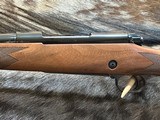 NEW WINCHESTER MODEL 70 SUPER GRADE 300 WIN MAG 26