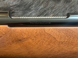 NEW WINCHESTER MODEL 70 SUPER GRADE 300 WIN MAG 26