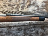 NEW WINCHESTER MODEL 70 SUPER GRADE 300 WIN MAG 26