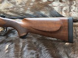 NEW WINCHESTER MODEL 70 SUPER GRADE 300 WIN MAG 26