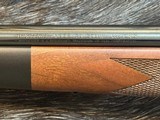 NEW WINCHESTER MODEL 70 SUPER GRADE 300 WIN MAG 26