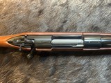 NEW WINCHESTER MODEL 70 SUPER GRADE 300 WIN MAG 26