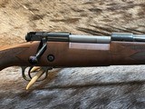 NEW WINCHESTER MODEL 70 SUPER GRADE 300 WIN MAG 26