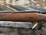 NEW WINCHESTER MODEL 70 SUPER GRADE 300 WIN MAG 26