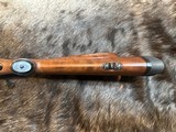NEW WINCHESTER MODEL 70 SUPER GRADE 300 WIN MAG 26