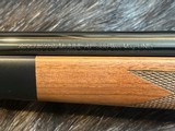 NEW WINCHESTER MODEL 70 SUPER GRADE 300 WIN MAG 26