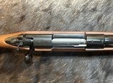 NEW WINCHESTER MODEL 70 SUPER GRADE 300 WIN MAG 26