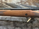 NEW WINCHESTER MODEL 70 SUPER GRADE 300 WIN MAG 26